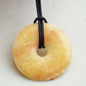 YELLOW JASPER DONUT GEMSTONE NECKLACE, CALF LEATHER CORD, 26 INCHES LONG, LIGHT